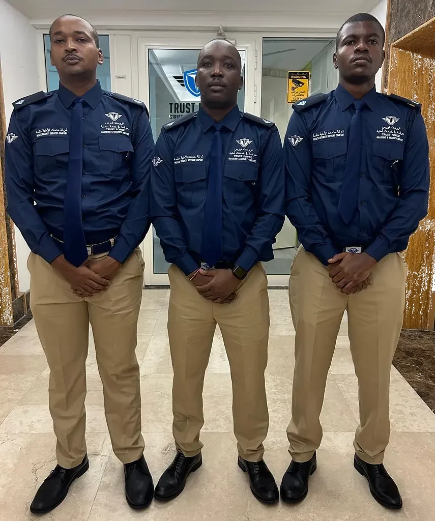 Trustforce Security guards in official uniform at the Doha, Qatar office, representing excellence in safety services.