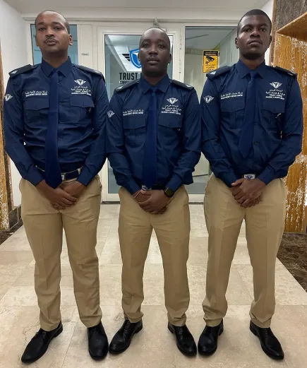 Trustforce Security guards in official uniform at the Doha, Qatar office, representing excellence in safety services.