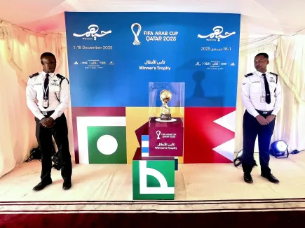 MOI-certified TrustForce Security guards safeguarding the FIFA Arab Cup 2025 Winner’s Trophy during the official display event in Doha, Qatar — organized by DOT Vision in collaboration with FIFA.
