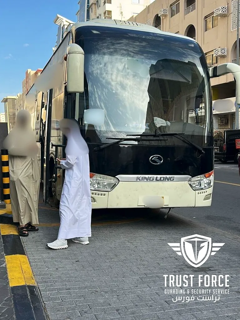 Passenger boarding a coach bus for TrustForce group evacuation transport from Doha, Qatar to Saudi Arabia