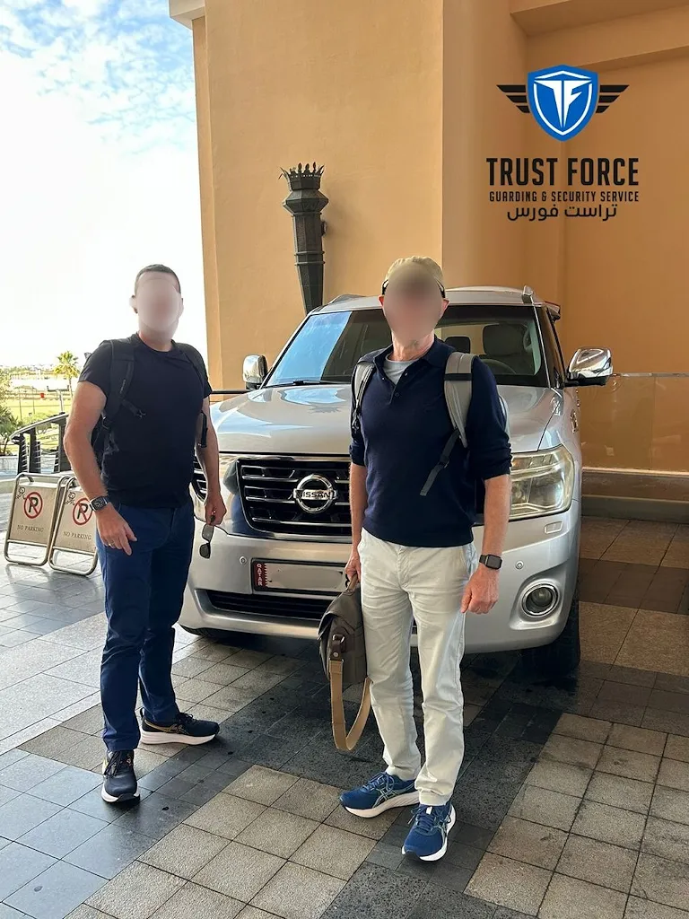 TrustForce security escort team with secure SUV vehicle ready for evacuation ground transport in Doha, Qatar